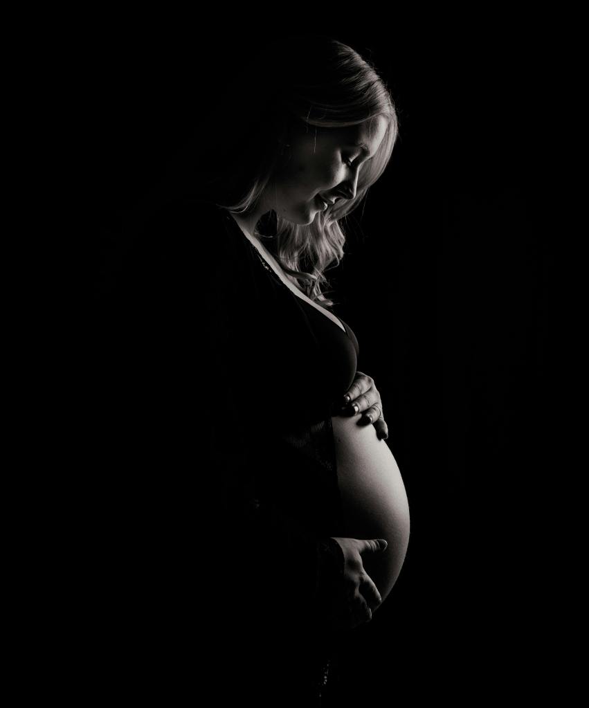 Black and white of pregnant woman